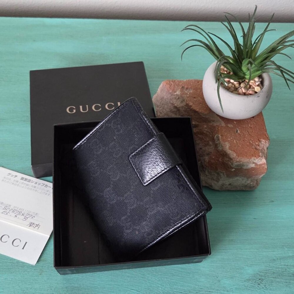 Gucci canvas bifold wallet